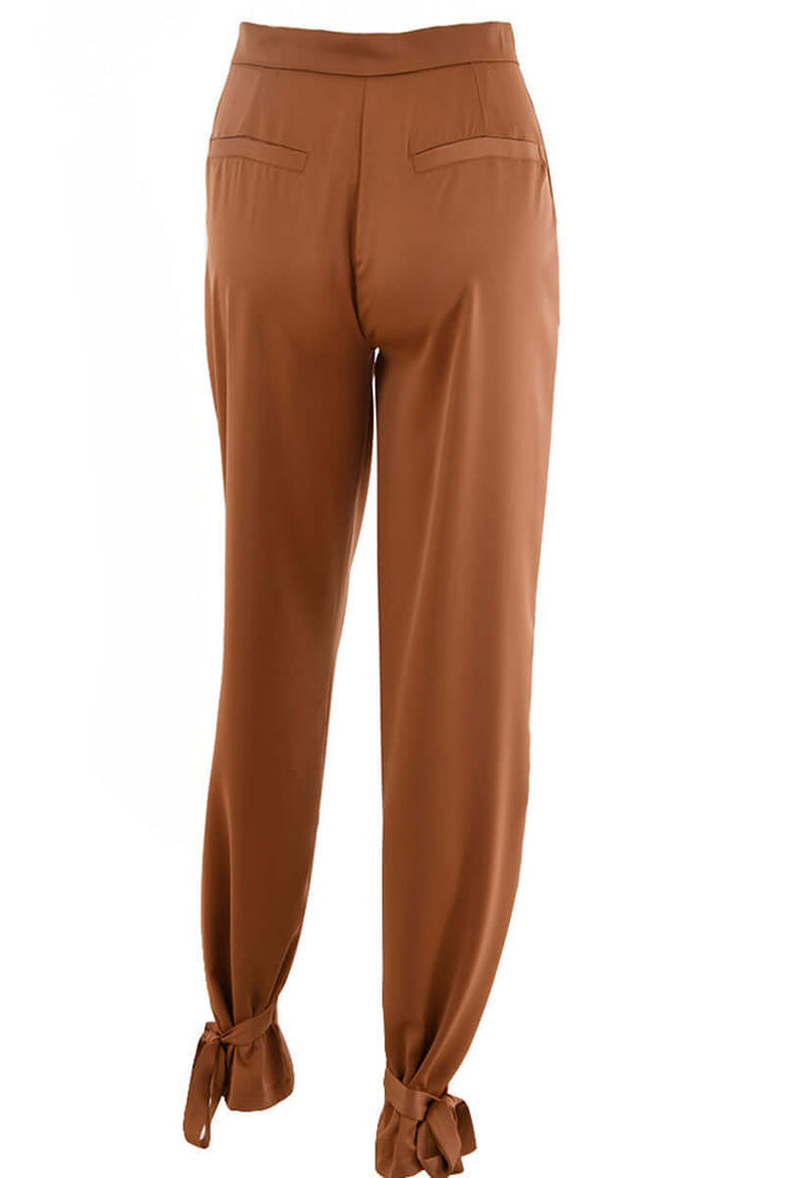 Elegant high-waisted tapered pants for women, featuring adjustable ankle ties for a customizable, chic look.