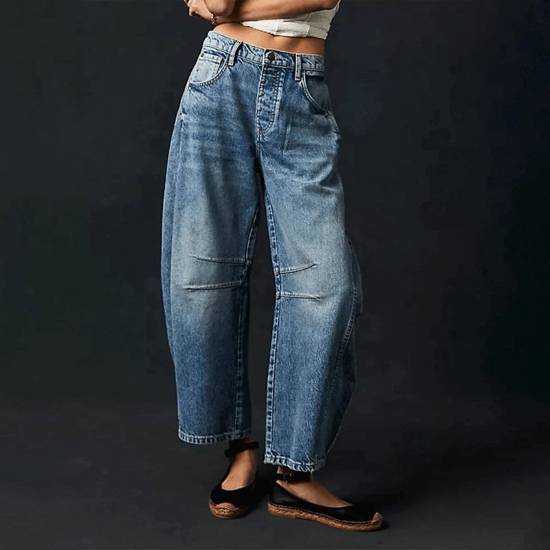 Dark blue women's high-waisted wide leg jeans, stylish denim for a versatile & comfortable modern look.