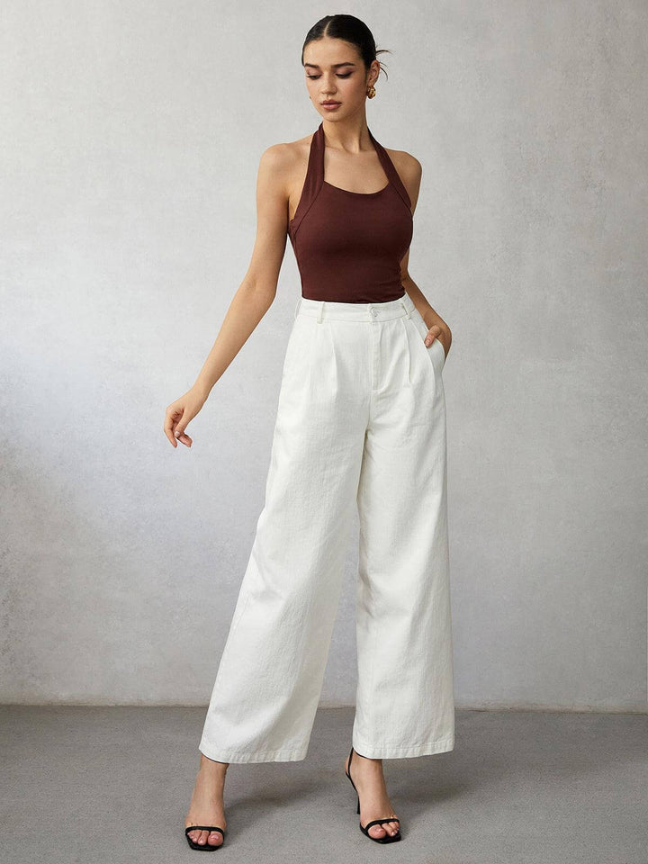 Chic women's high-waisted wide-leg jeans in premium denim. Trendy and comfortable fashion bottoms.