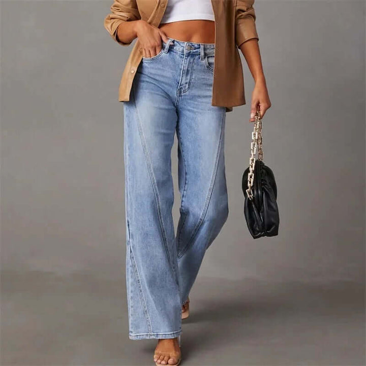 Classic blue stretch denim wide leg jeans for women, featuring a comfortable high waist and a flattering, relaxed fit.