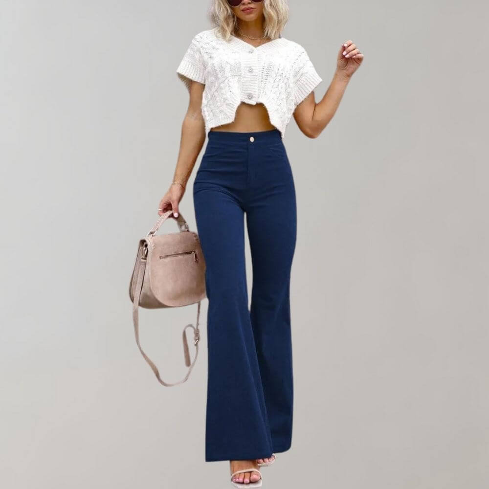 Close-up of the high-waisted detail on stylish women's wide leg trousers, designed for a comfortable fit.