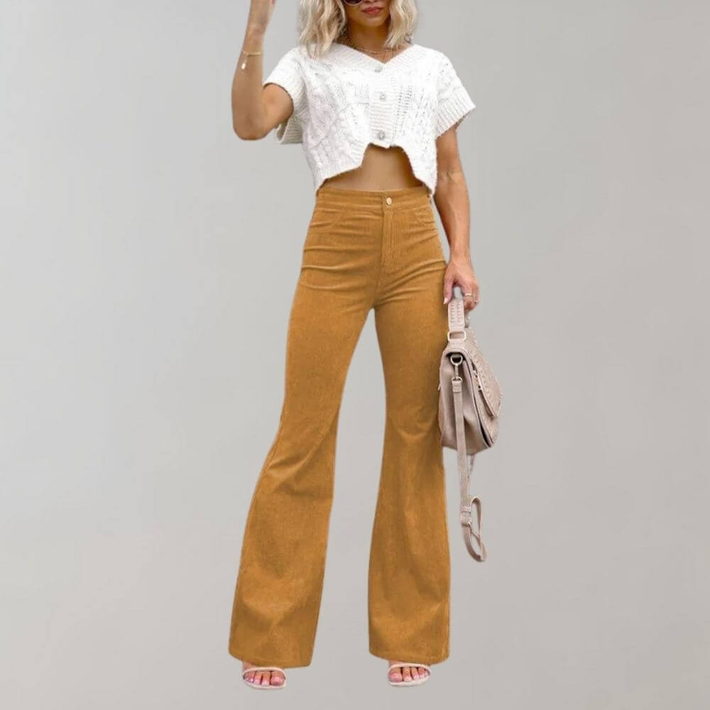 Soft fabric texture of women's high-waisted wide leg trousers, emphasizing comfortable and elegant drape.