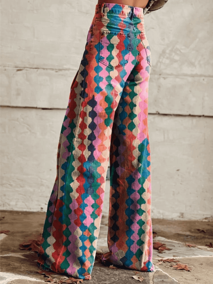 Stylish red wide-leg women's pants featuring a bold retro print, perfect for elegant or casual wear.