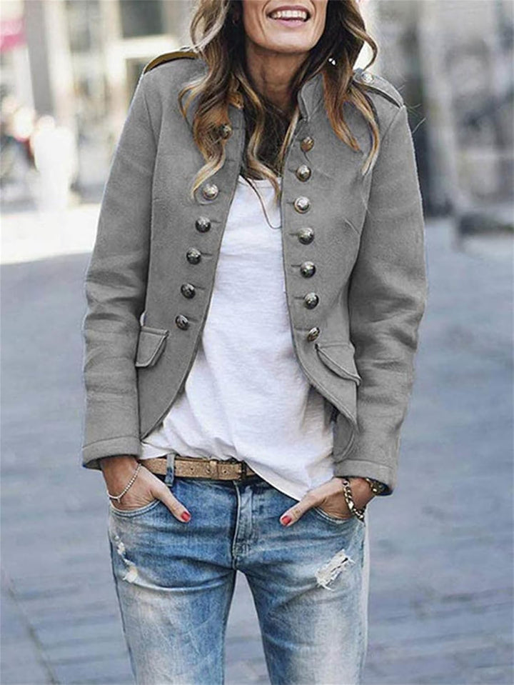 Fashionable women's outerwear: structured military style jacket with epaulettes & button closure, hip length.