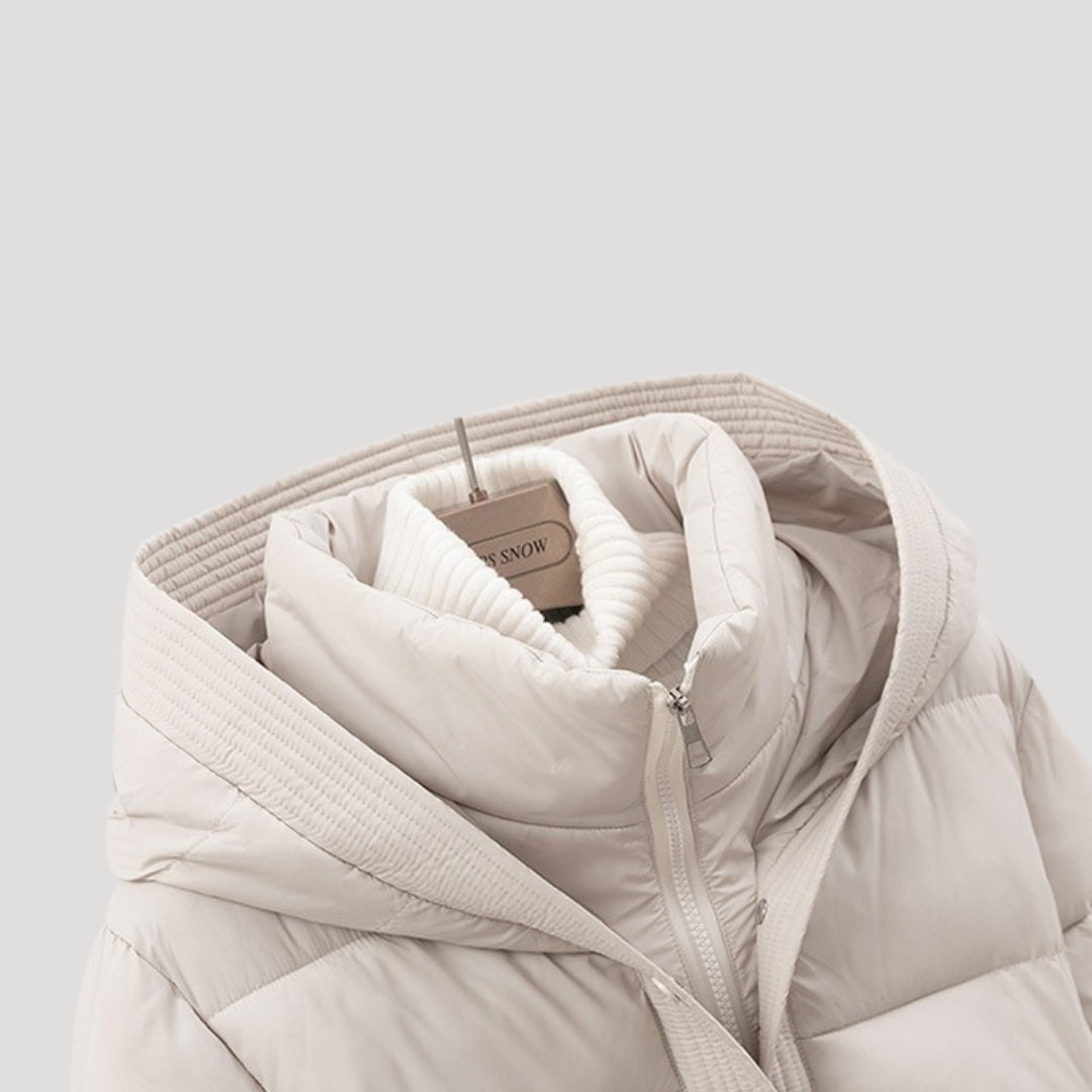 Warm women's hooded puffer jacket with a flattering belt. Perfect winter coat for women.
