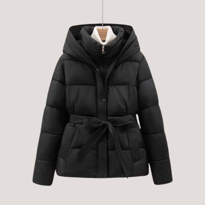 Durable women's hooded puffer winter coat with belt. Provides ultimate warmth & style.