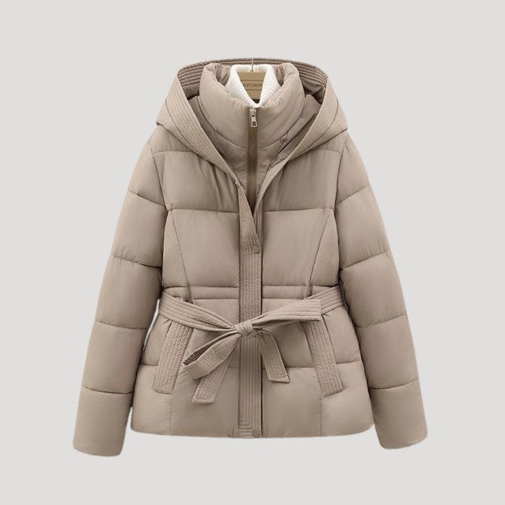 Comfortable women's belted puffer jacket with hood. Designed for cozy cold weather protection.