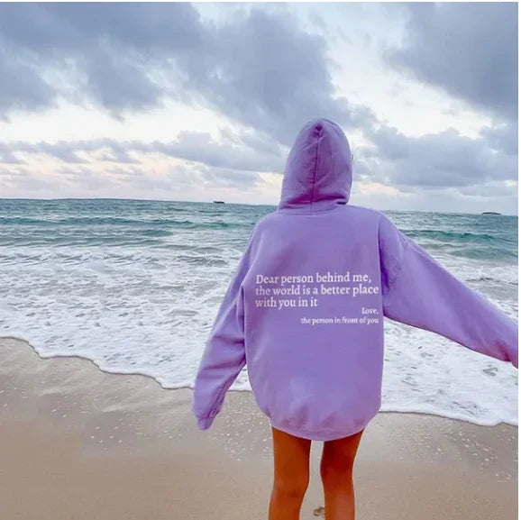 Soft women's hooded sweatshirt, perfect for cozy everyday comfort & casual fashion style.