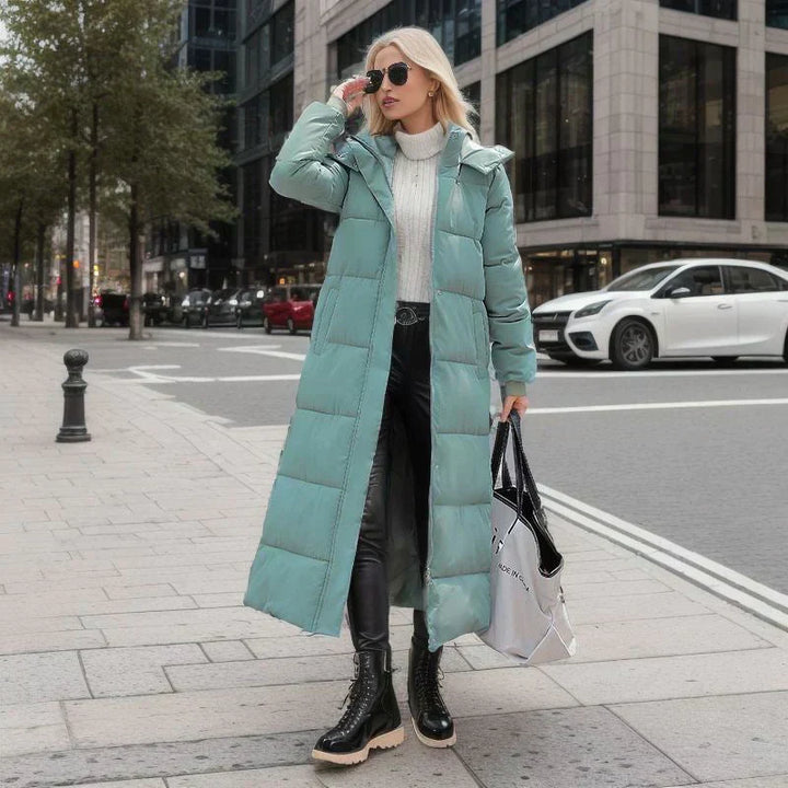 Stylish female apparel: long Isabella winter coat in navy, perfect for cold weather outerwear.