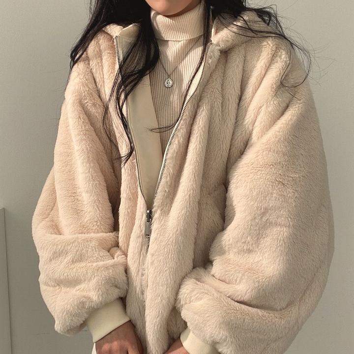 Two-in-one women's hooded jacket, a versatile winter coat for everyday casual wear.