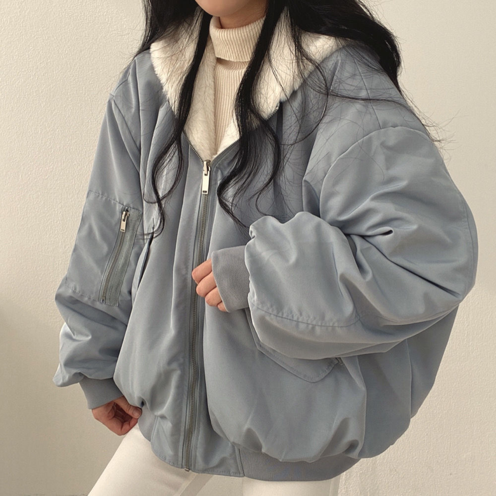 Stylish women's hooded winter coat, reversible design, perfect for fall & winter outerwear.