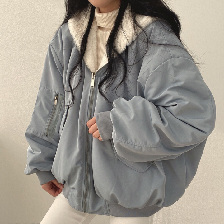 Stylish women's hooded winter coat, reversible design, perfect for fall & winter outerwear.