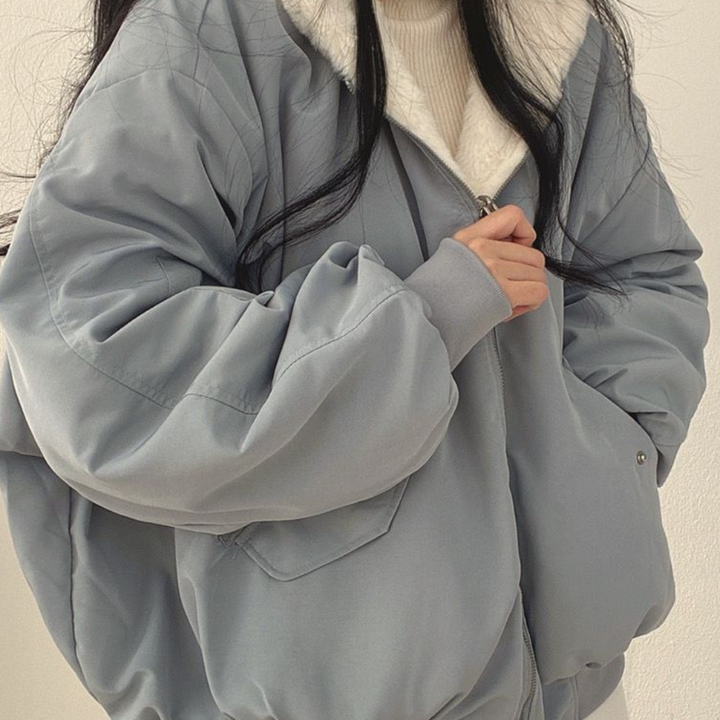 Front view: Women's Isla reversible winter coat, offering warmth & versatile fashion.