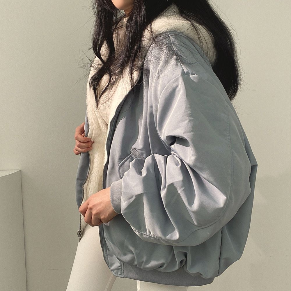 Back view: Women's hooded reversible jacket, essential for stylish fall winter outerwear.
