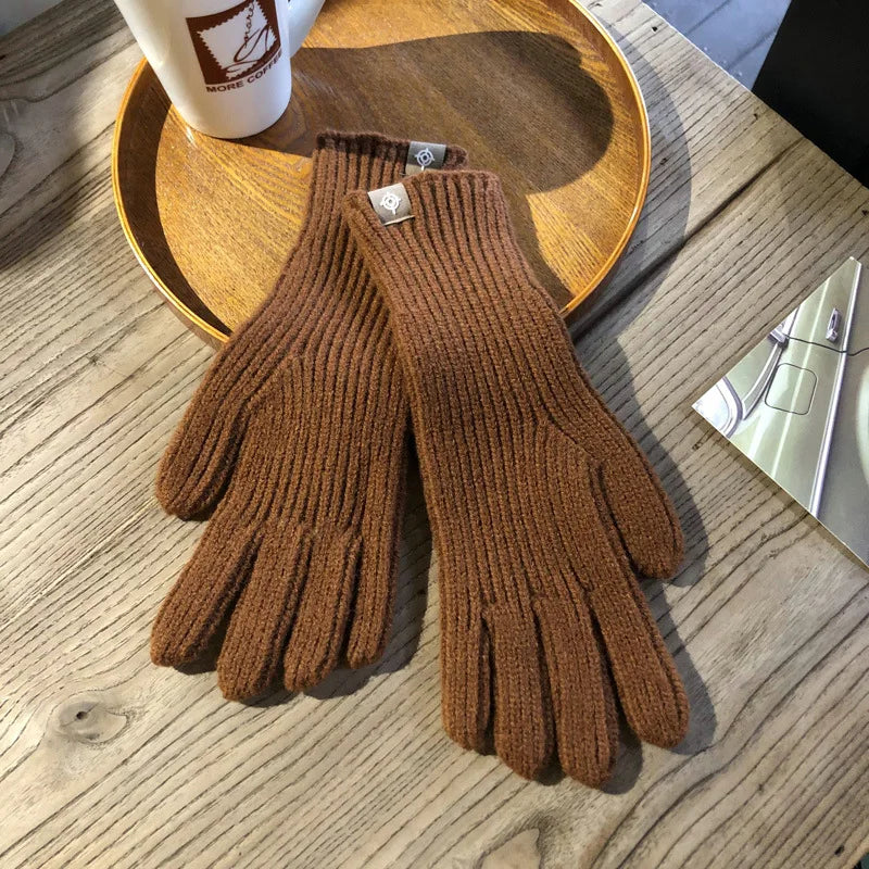Women's Isolde warm touchscreen gloves in soft cotton, perfect for winter comfort & phone use.