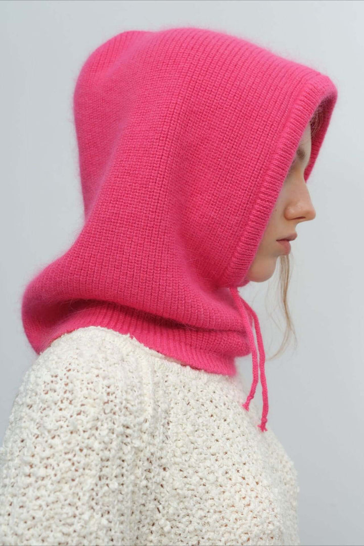 Warm women's knitted balaclava scarf, ideal for winter. Cozy hood headwear for cold weather fashion.