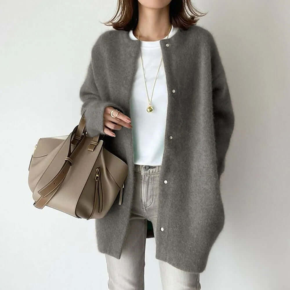 Chic women's long-sleeve knitted button-up cardigan, ideal for casual fall & winter warmth.