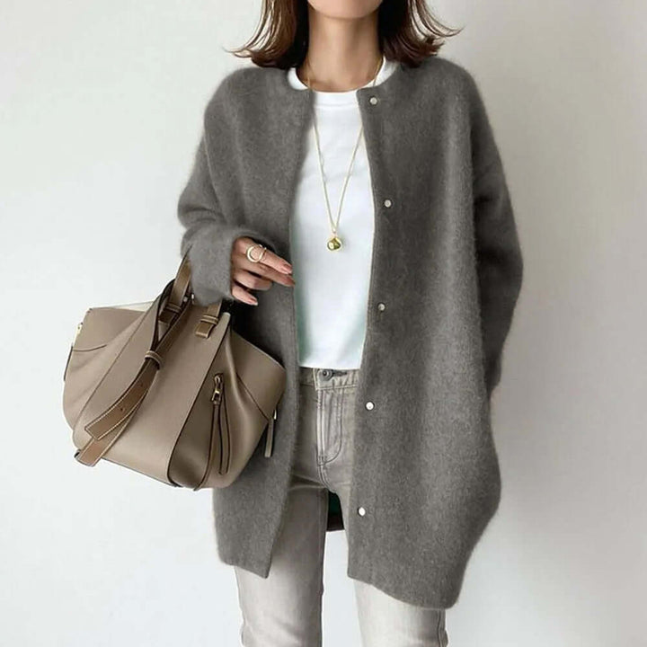 Chic women's long-sleeve knitted button-up cardigan, ideal for casual fall & winter warmth.