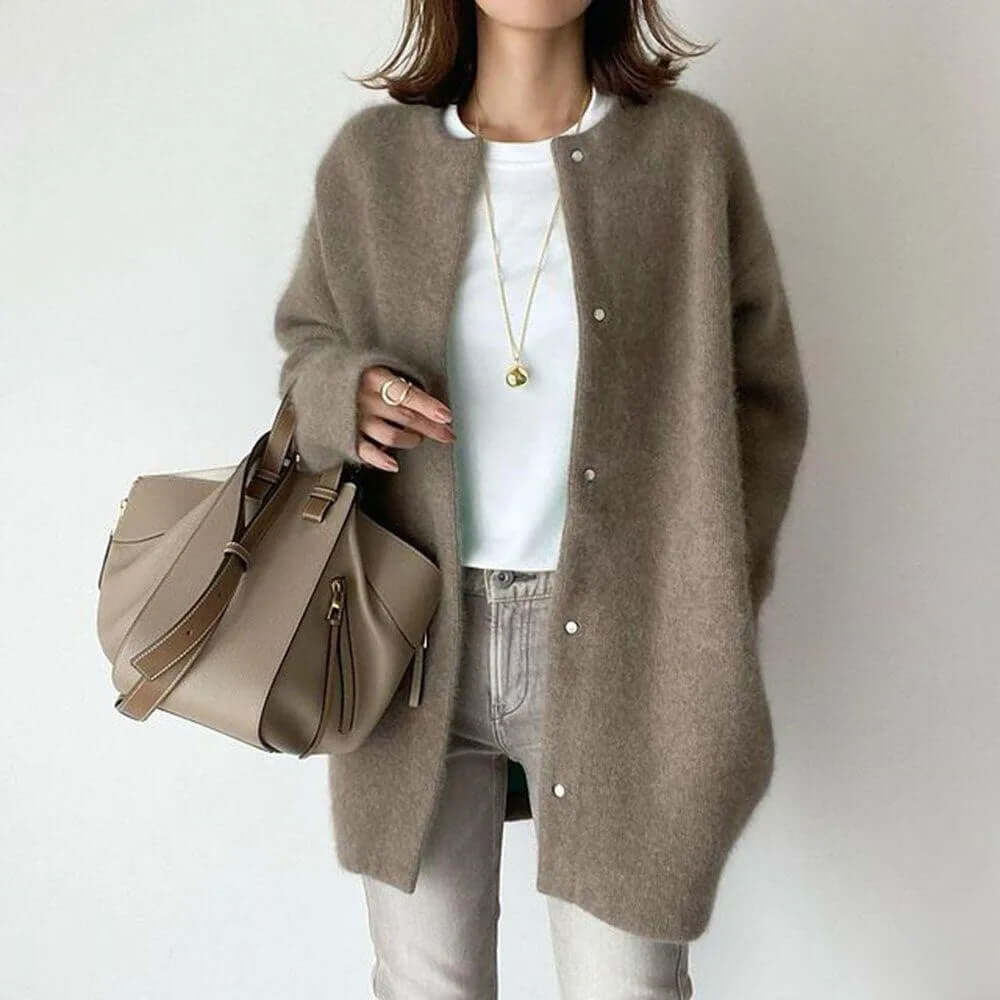 Fashionable & comfortable women's button-up knitted cardigan sweater, essential for cozy winter style.