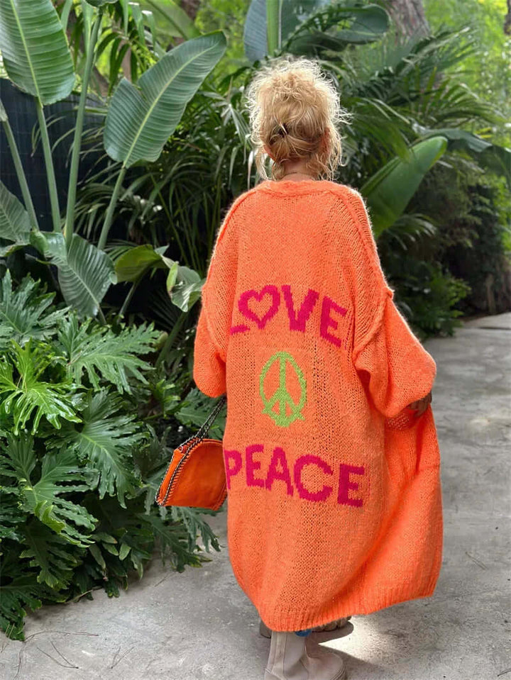 Women's knitted "Comfort & Peace" cardigan sweater. Cozy, casual fall fashion layering.