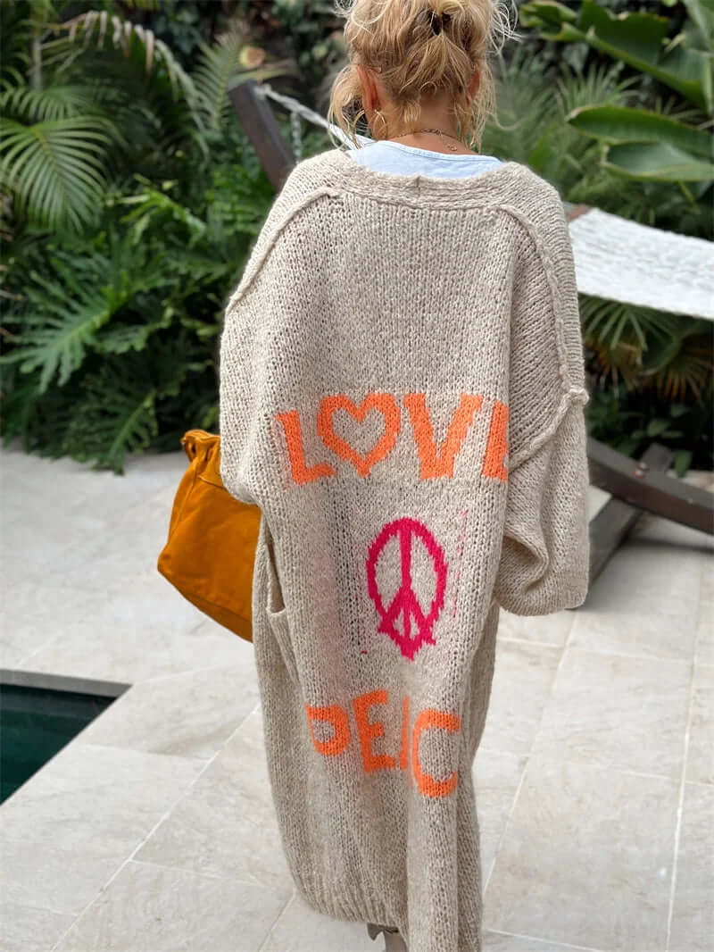 "Love Peace" design women's knitted cardigan. Stylish, cozy sweater perfect for casual fall & winter layering.