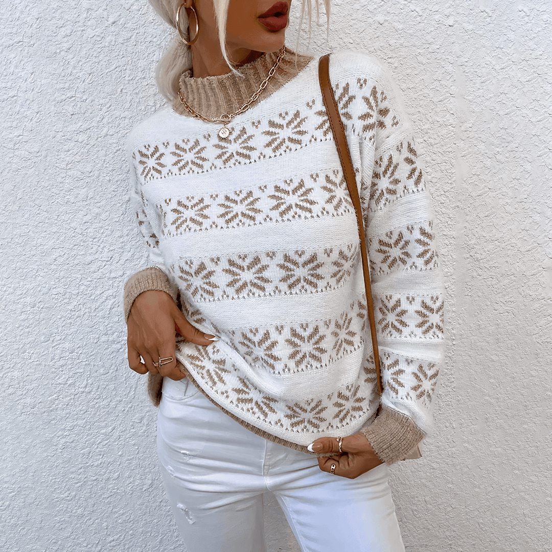 Elegant women's knitted snowflake turtleneck, a warm and stylish long-sleeve sweater for winter's chill.