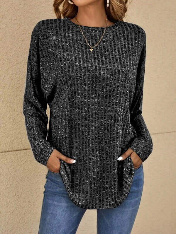 Women's knitted stretchy long sleeve top for casual comfort. Soft, versatile everyday fashion.