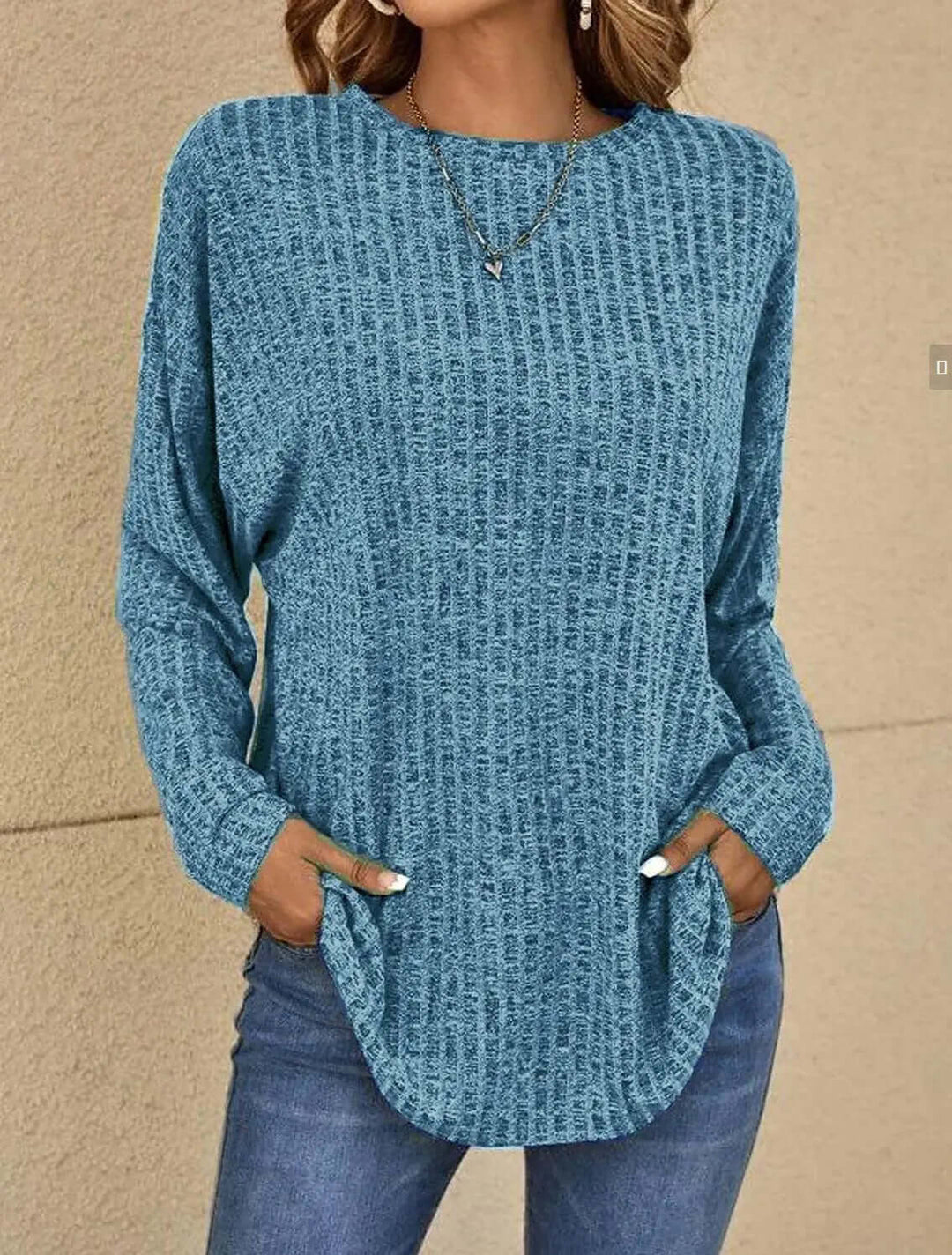 Comfortable women's stretchy knitted long sleeve top. Perfect for casual everyday wear & style.