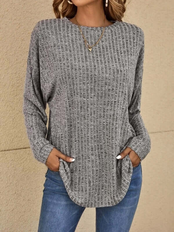 Versatile women's long sleeve knitted top. Stretchy, soft knit for ultimate casual comfort and fashion.