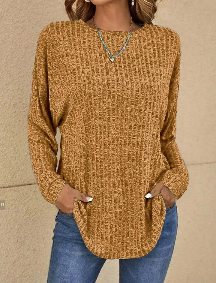 Casual women's knitted long sleeve top. Stretchy fabric ensures comfortable, versatile everyday wear.