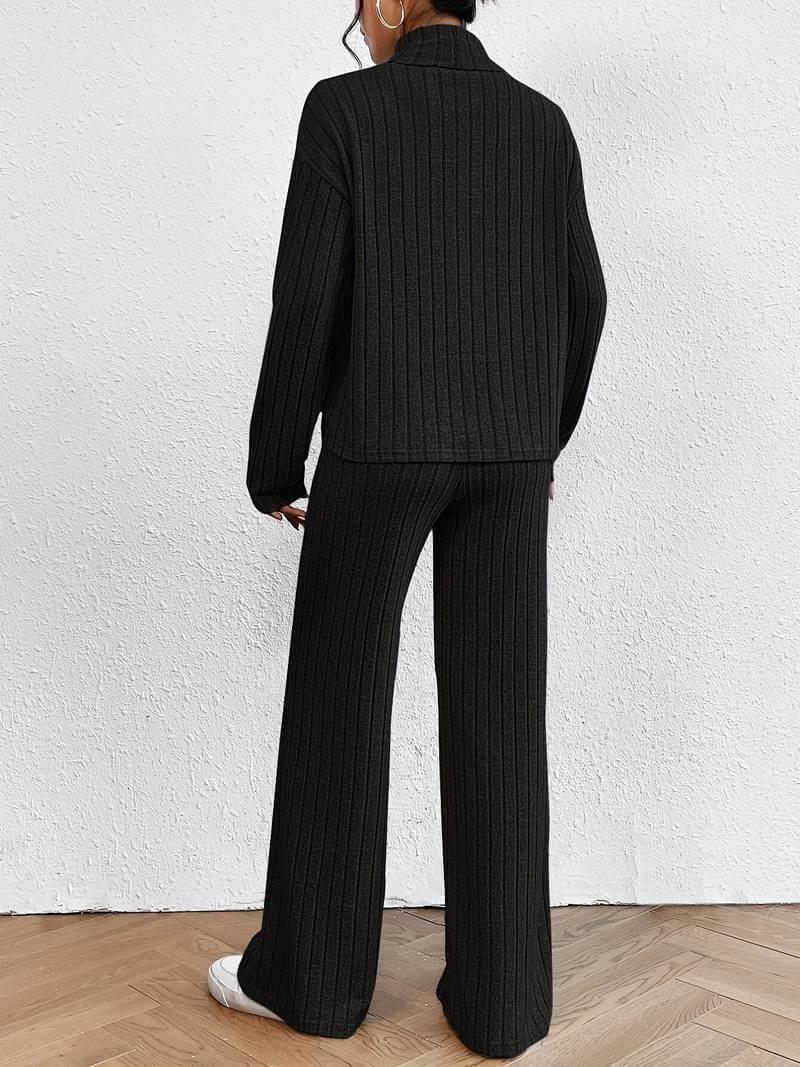 Soft knitted women's set: elegant turtleneck sweater and flowing wide-leg pants for chic, versatile fall outfits.