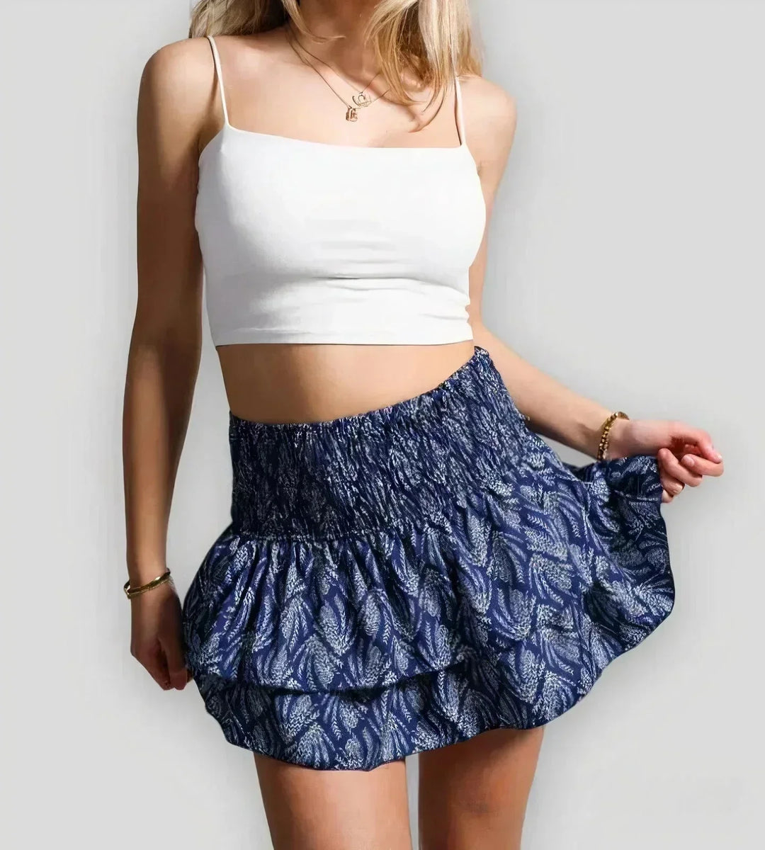 Casual women's layered A-line mini skirt. Short, flowy, and comfortable summer style.