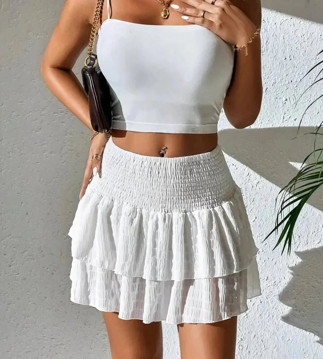 Flattering A-line mini skirt for women, featuring a chic layered design. Great for summer outfits.