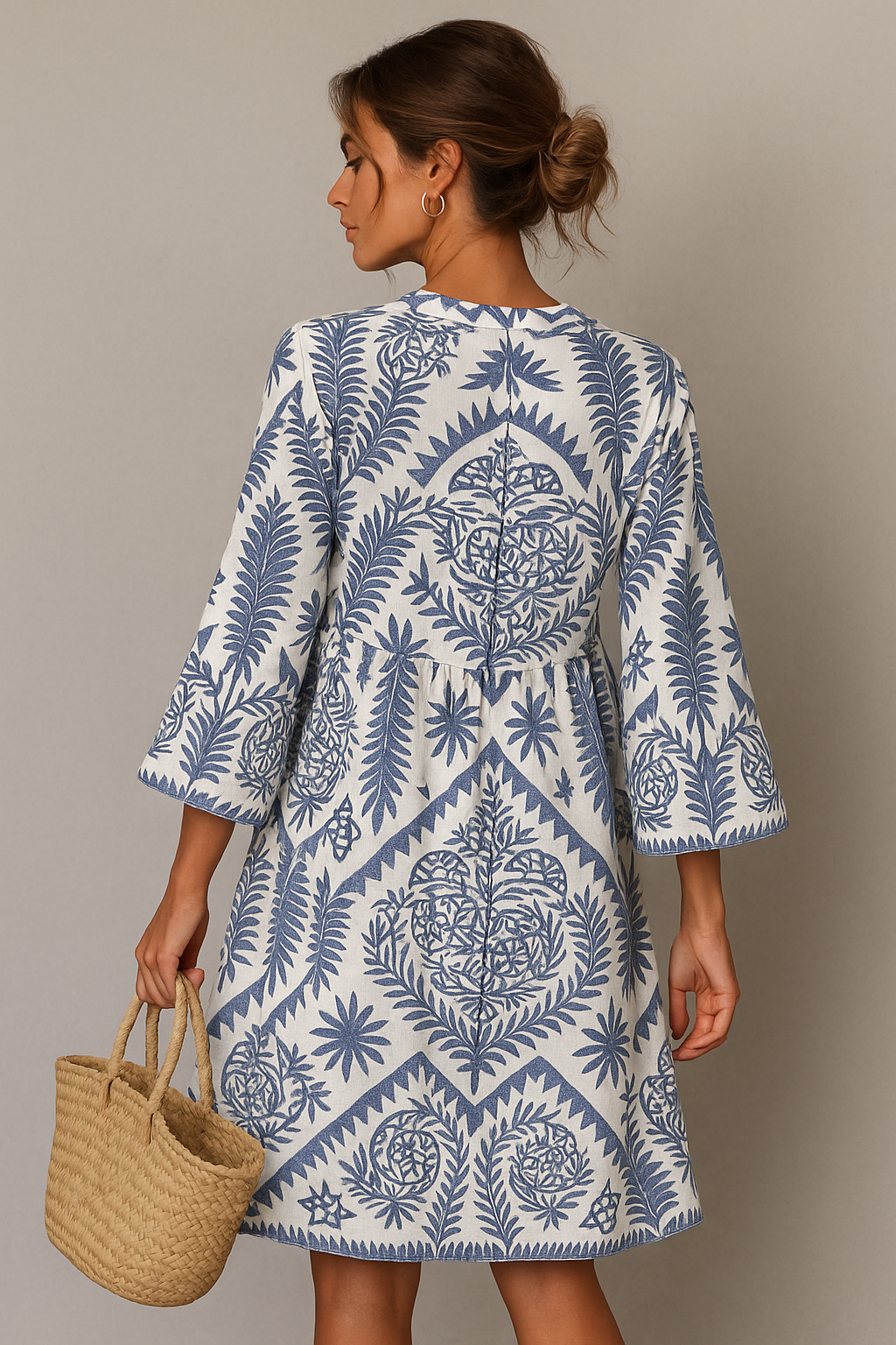 Flowy women's summer midi dress with a V-neck and vibrant boho pattern, ideal for casual wear or vacation.