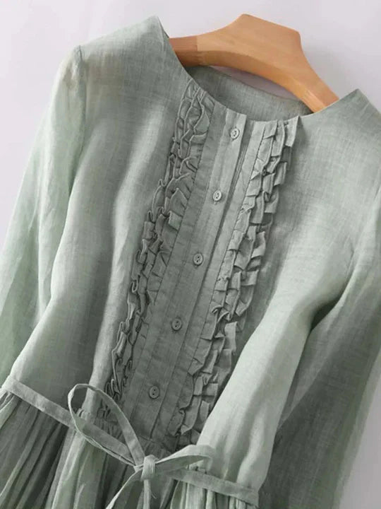 Women's light & chic summer sundress with short sleeves, o-neck, & ruffle details. Perfect casual vacation wear.