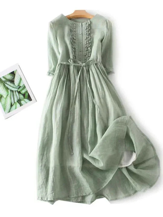 Elegant women's ruffle sundress with o-neck & short sleeves. A light, chic choice for summer & vacation.
