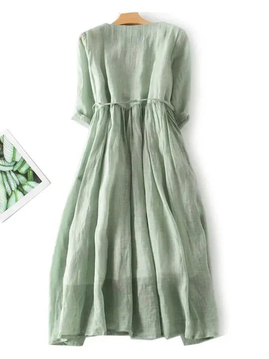 Versatile women's casual summer dress, light & airy. Features short sleeves & ruffles, great for beach or holiday.