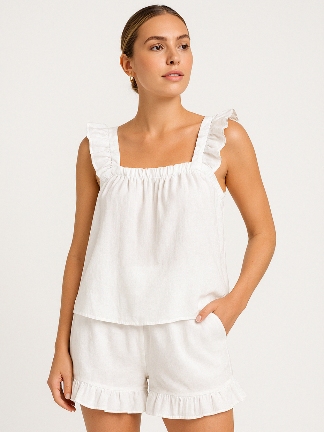 Women's light & comfortable ruffle summer pajama set. Sleeveless top & shorts for feminine loungewear.
