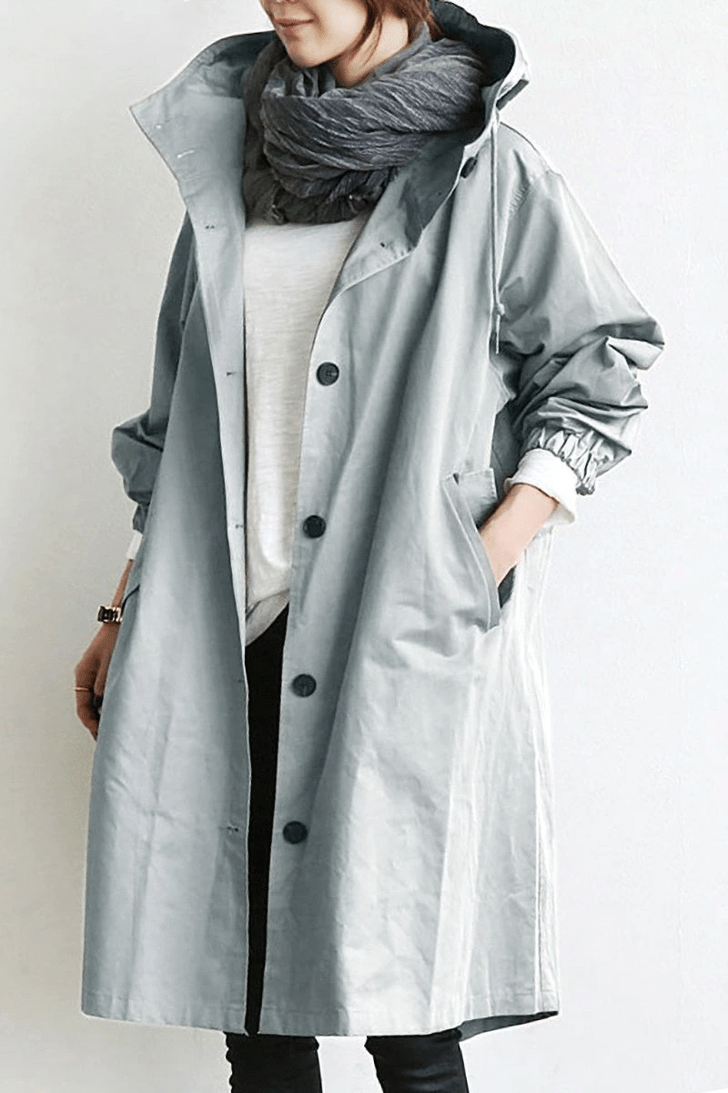 Weatherproof women's Aurora windbreaker jacket with hood, lightweight, perfect for rain & wind protection.