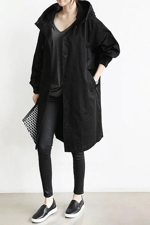 Hooded oversized women's Aurora windbreaker jacket, lightweight & packable, essential for travel outerwear.