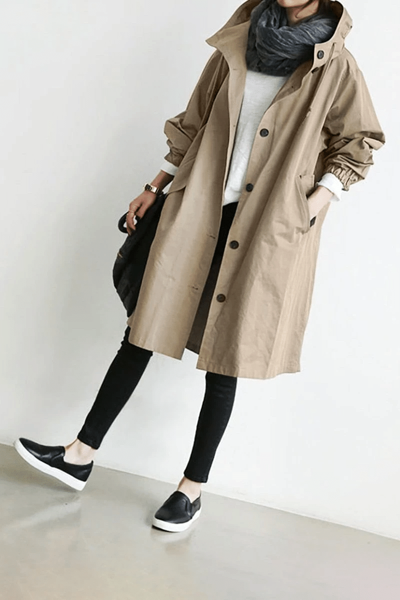 Women's Aurora windbreaker, a lightweight hooded jacket for active lifestyles, stylish and protective.