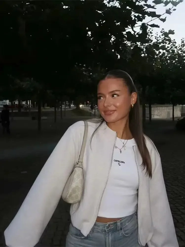 Spring fashion: women's lightweight bomber jacket, a stylish cropped outerwear piece with balloon sleeves.