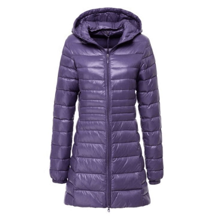 Warm women's long down coat. A stylish, lightweight winter jacket for casual wear in cold weather.