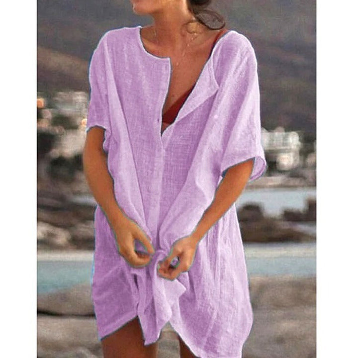 Soft, lightweight fabric midi beach dress cover-up for women, great for casual resort wear.