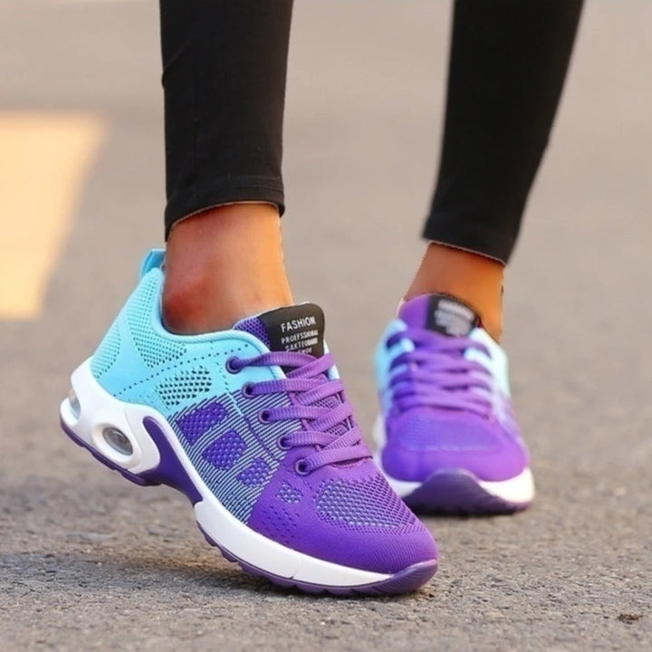 Women's lightweight athletic walking shoes with advanced air cushion for shock absorption.