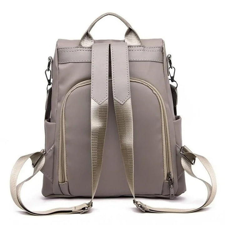 Close-up of a stylish lightweight water-resistant women's nylon backpack. Durable for everyday carry.