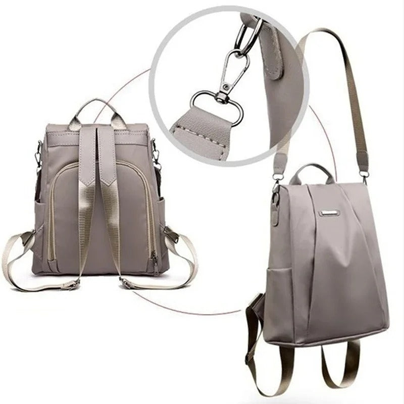 Multi-way women's nylon backpack, shown as a shoulder bag. Lightweight, water-resistant, great for travel.