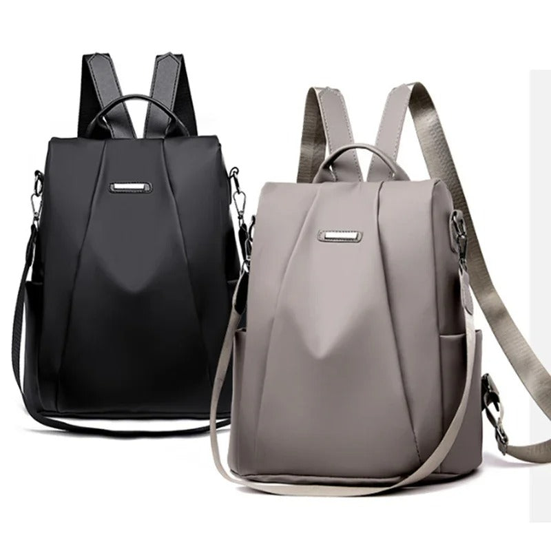 Minimalist lightweight water-resistant nylon backpack for women. Versatile multi-way design for daily use.