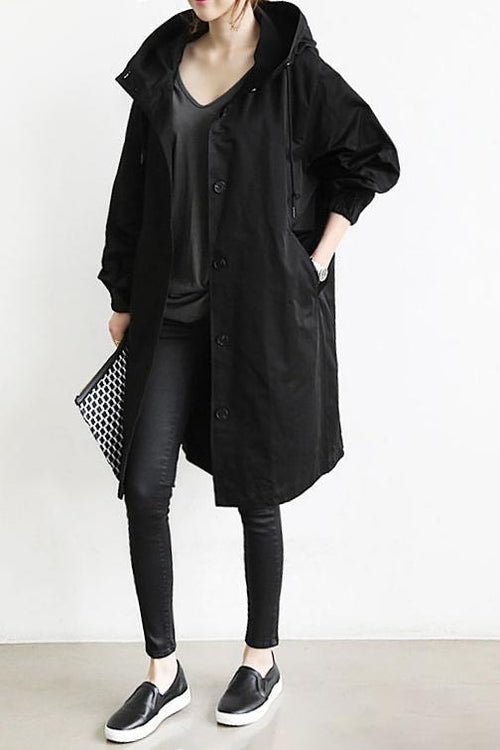 Stylish women's hooded rain trench coat, lightweight & waterproof, perfect for travel & everyday.