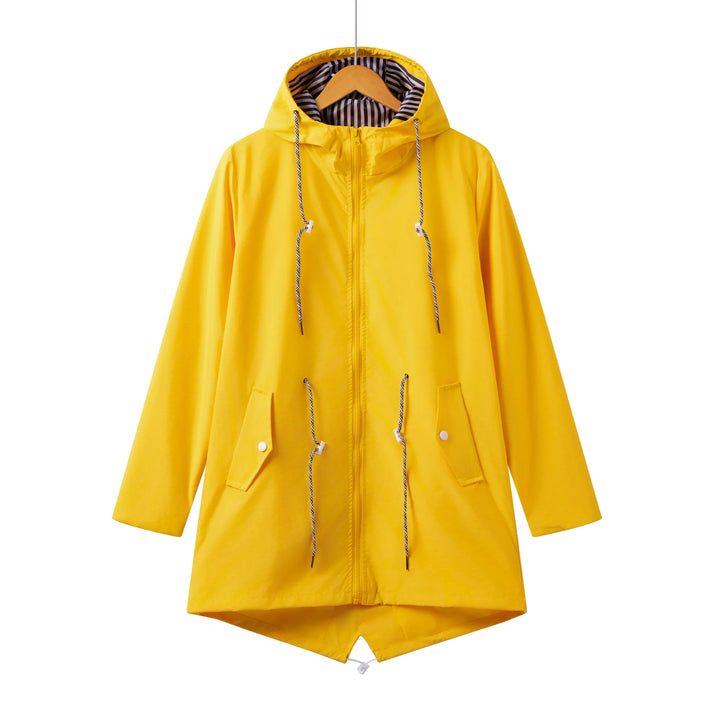 Close-up of a women's waterproof hooded trench coat fabric, highlighting its lightweight and protective nature.